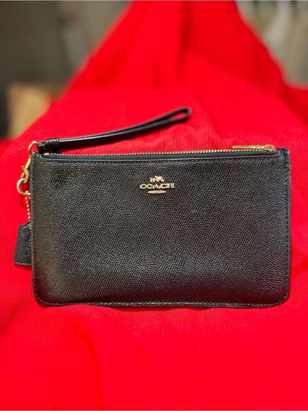 Coach Black Leather Wristlet with Gold Logo